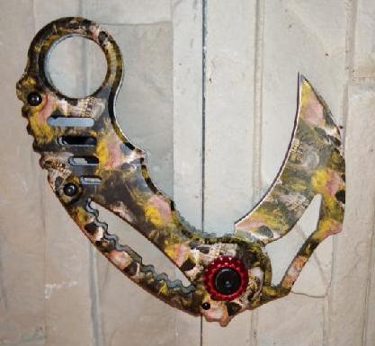 Nůž karambit sklápěcí - oranžový se vzory