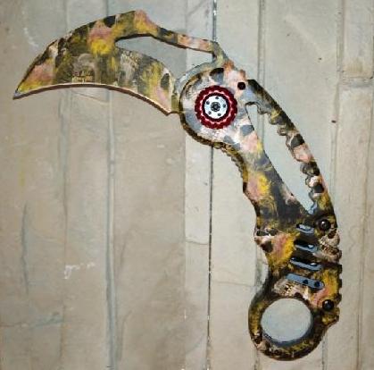 Nůž karambit sklápěcí - oranžový se vzory