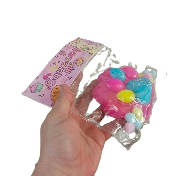 Relaxační silikonová tlapka Squeezy - růžová/multikolor