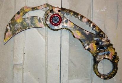 Nůž karambit sklápěcí - oranžový se vzory